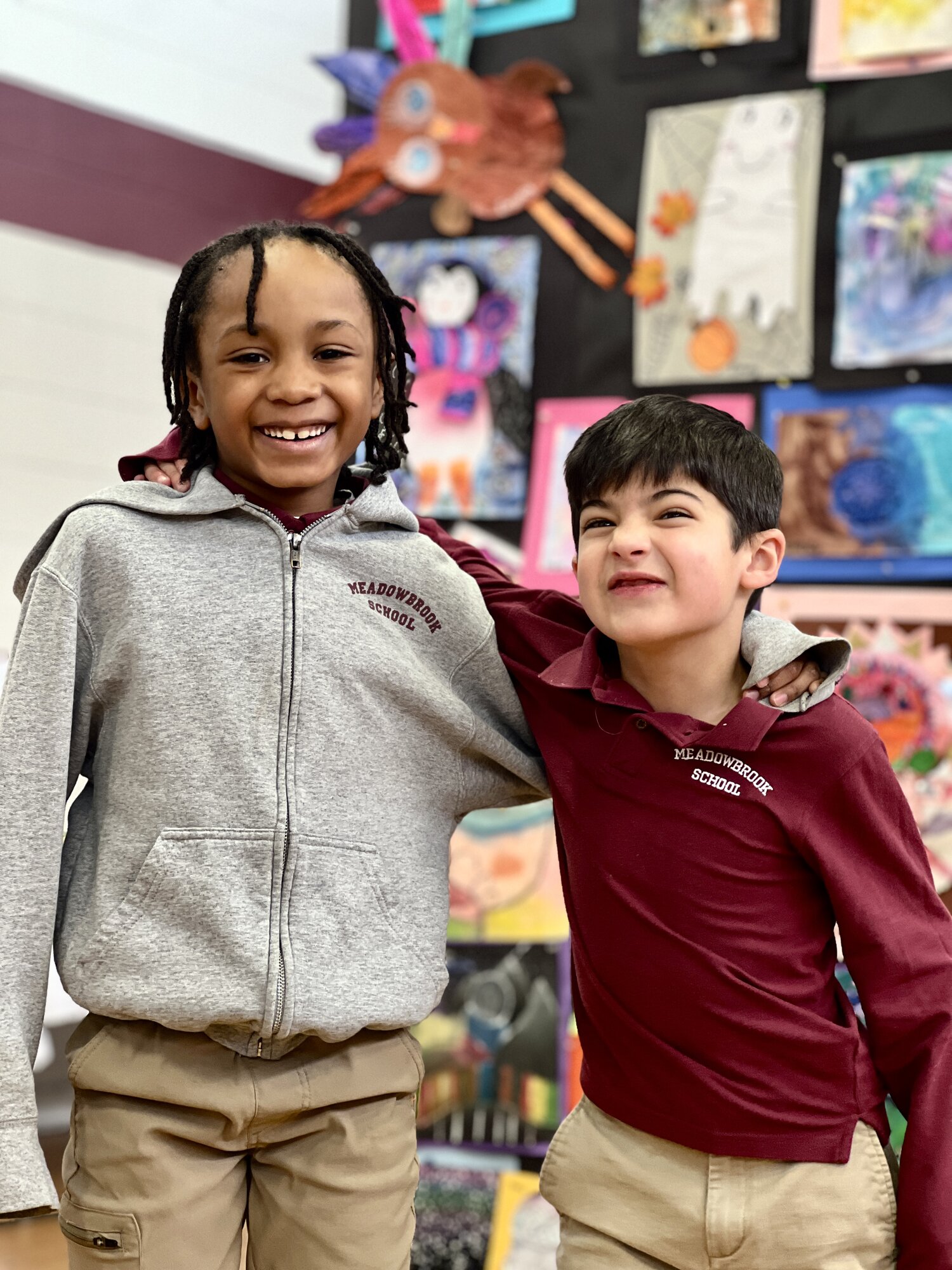 Service learning students helping in classroom